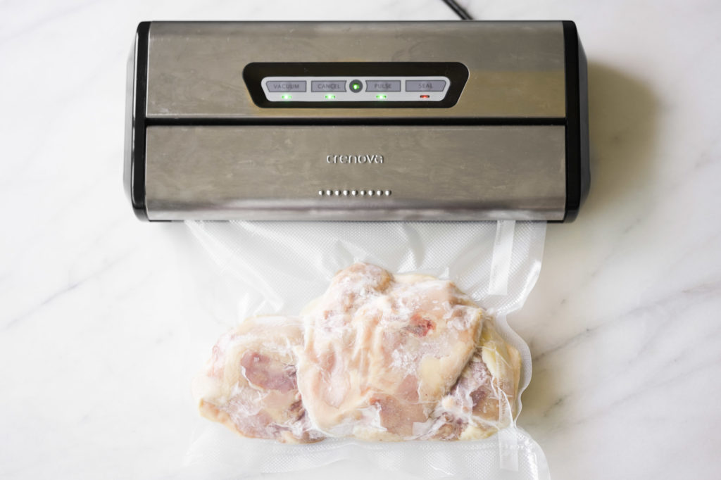 vacuum seasling chicken for the freezer