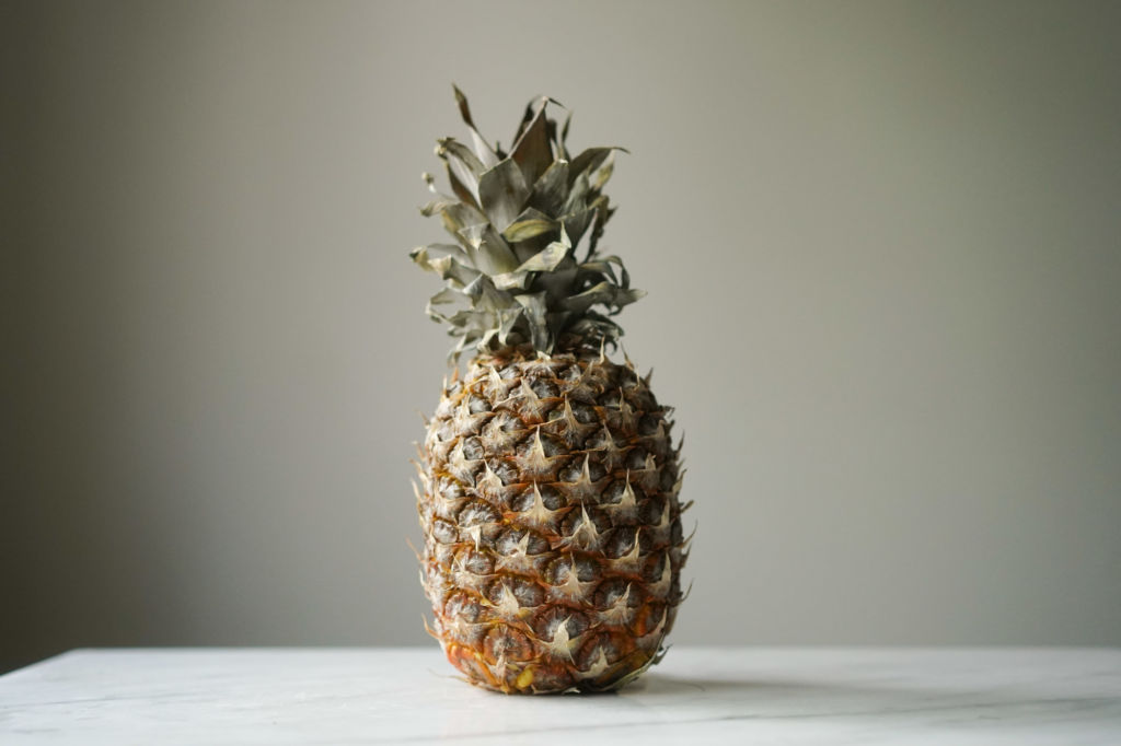 lone pineapple on a table