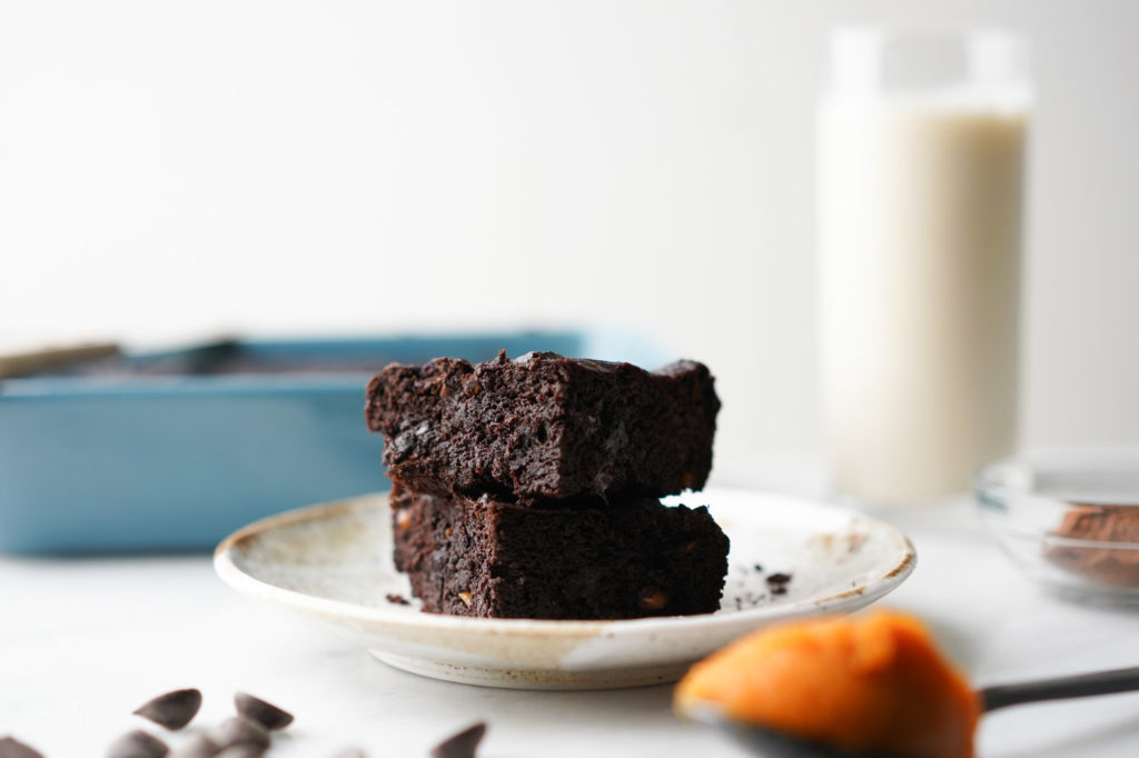 healthy pumpkin brownie squares on a plate