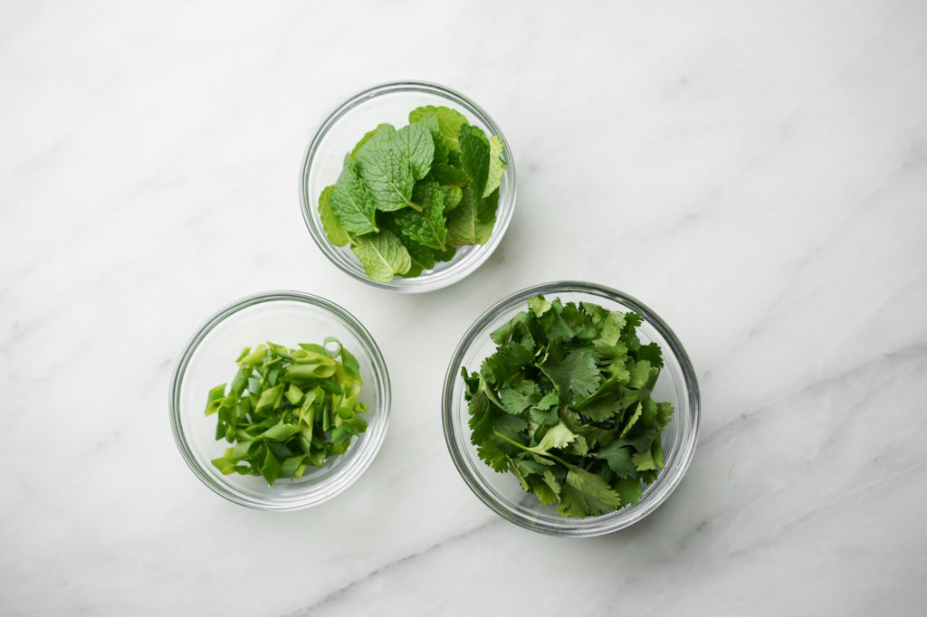 herbs in glass bowls