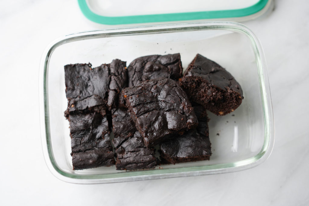 baked healthy pumpkin brownies in container