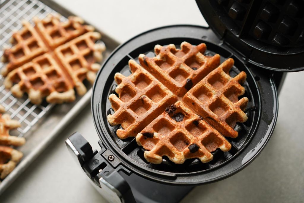 oatmeal waffle in hot waffle iron