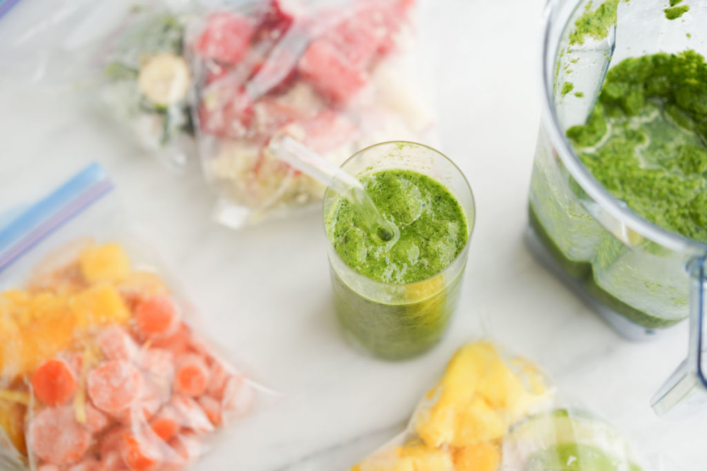smoothie packs, blender, and smoothie cup