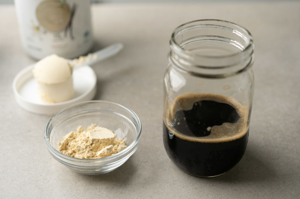 protein powder scoop and coffee