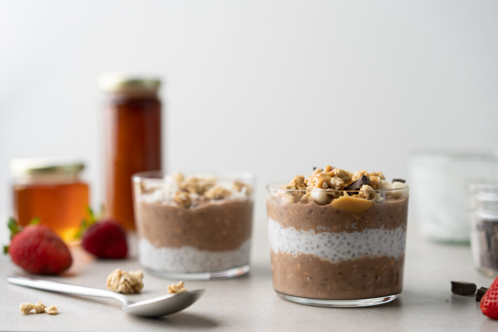 two glasses of chocolate peanut butter overnight oats
