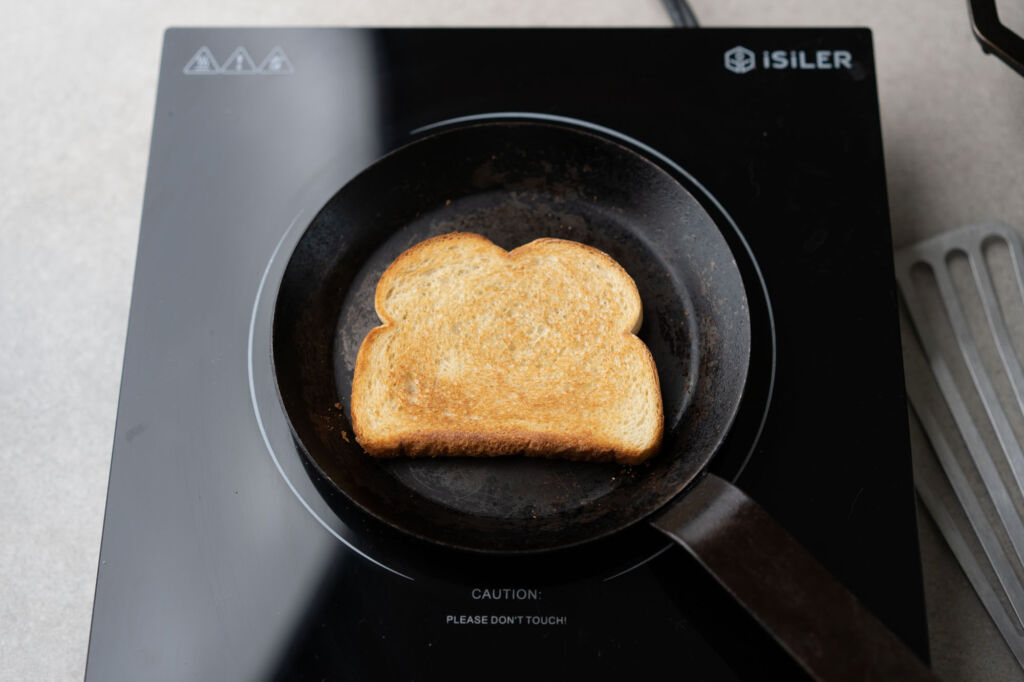 toast in carbon steel pan
