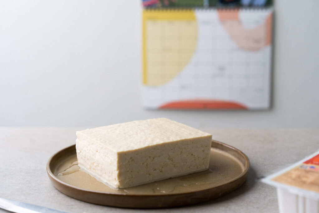 block of tofu next to calendar