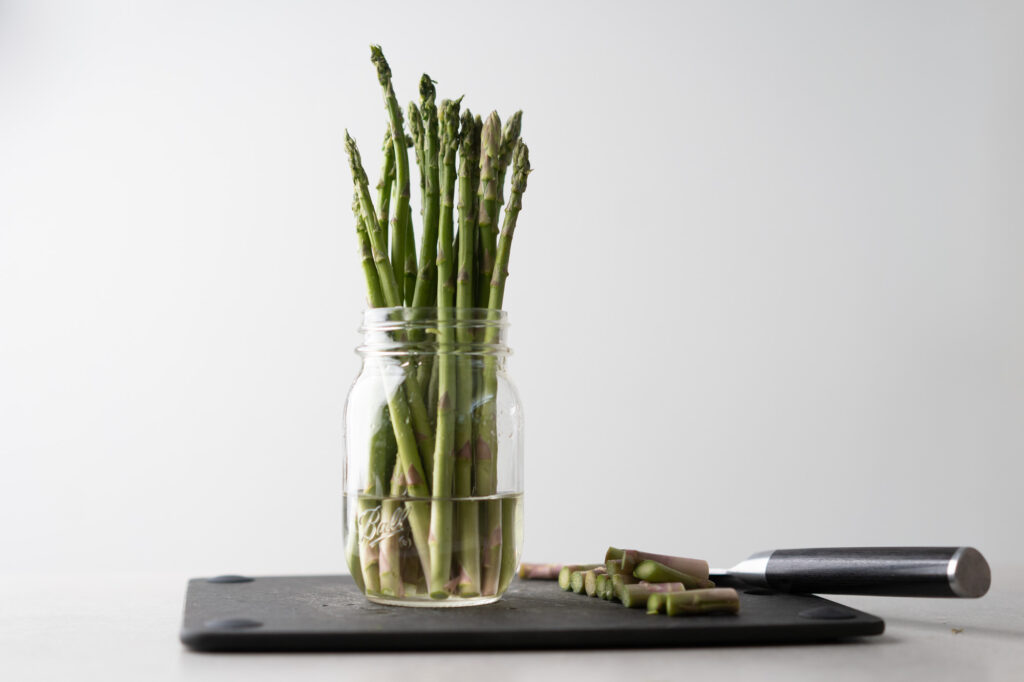 asparagus bunch in water