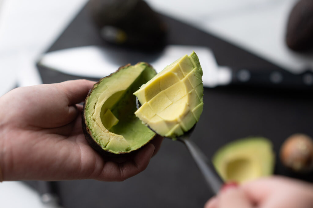scooped cubed avocado