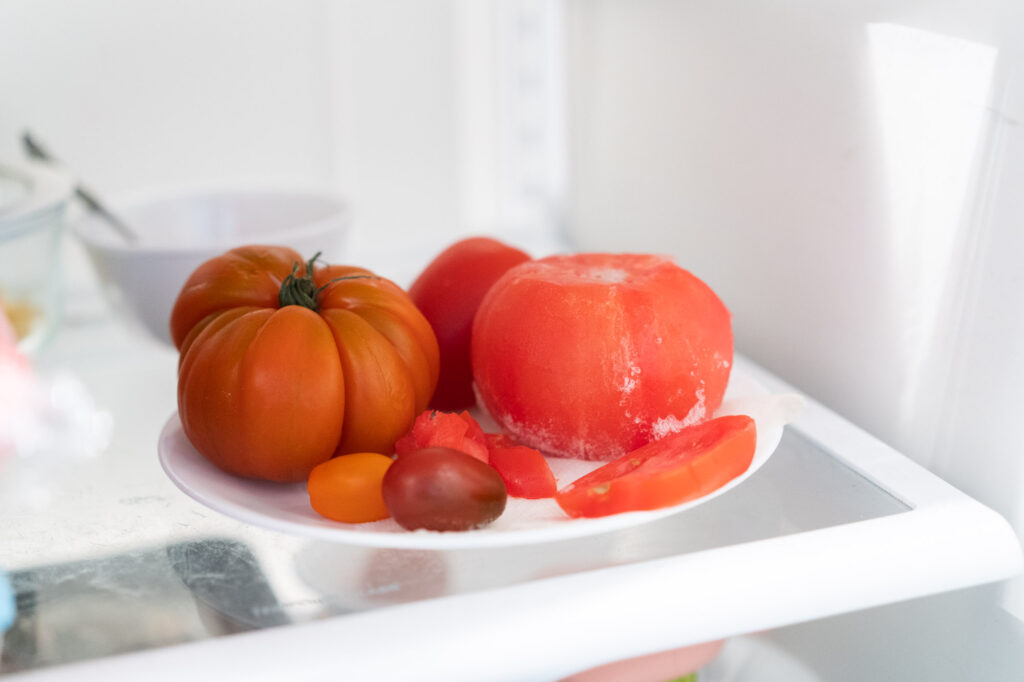 thawing frozen tomato in refrigerator